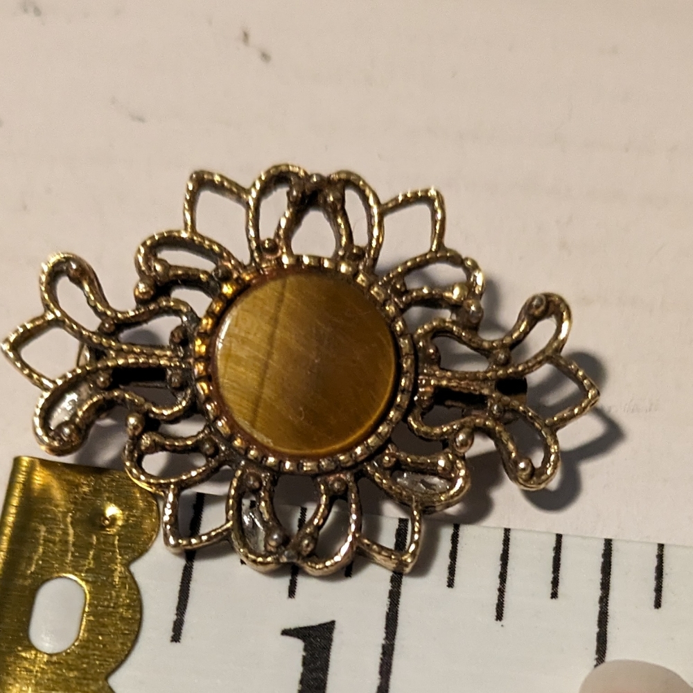 Vintage brooch gold tone filigree brown stone signed LG Lind Gal